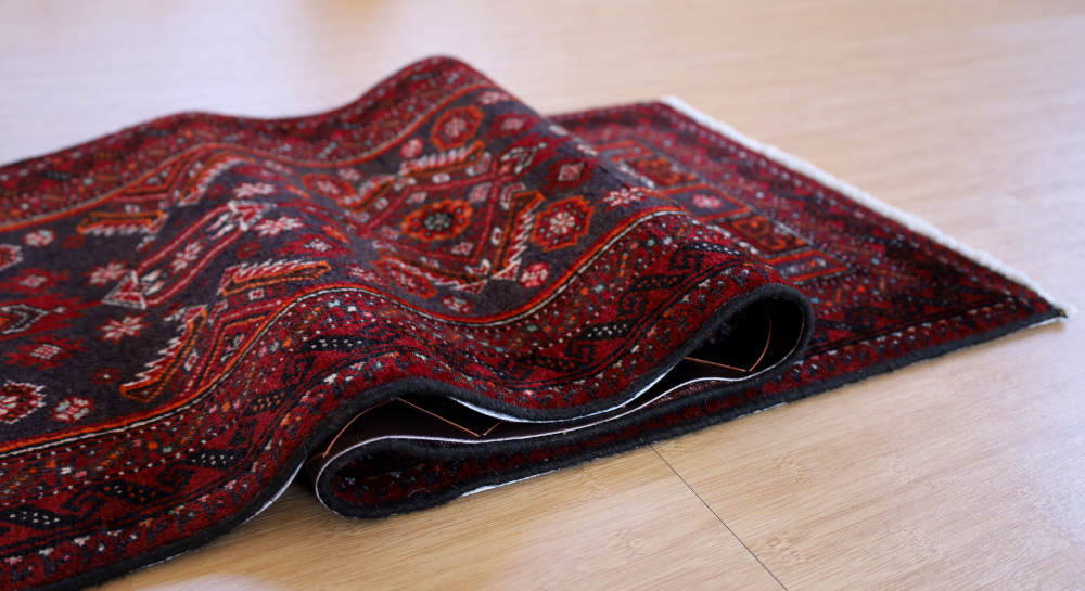ペルシャ絨毯 バルーチ族 187×46cm 端を持ち上げたところ