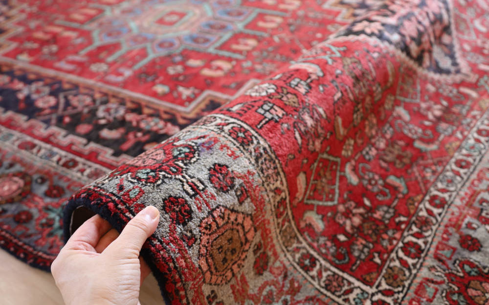 ペルシャ絨毯 イラン、ゴルトゥーグ産 212×142cm 縁の厚みの様子