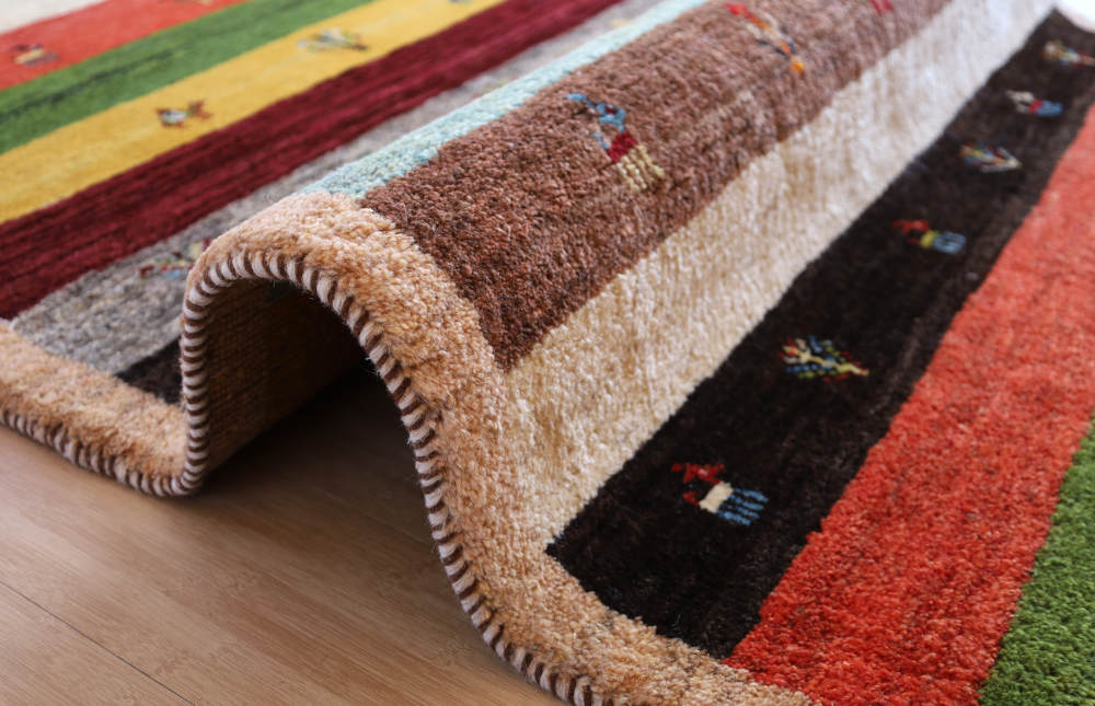 ギャッベ　イラン産　177×120cm　cg21081　端処理や厚み、織り目の様子