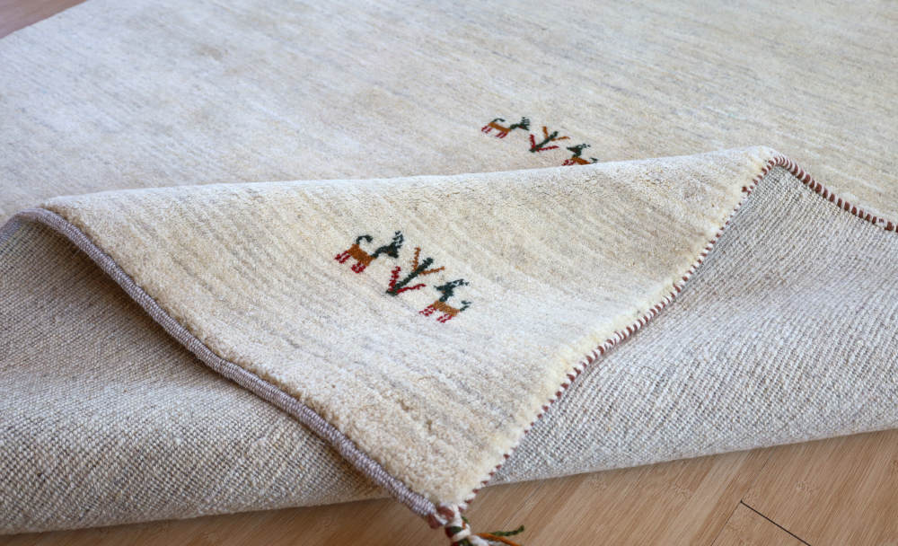 ペルシャギャッベ 　228×173cm　cg21624　角を折り曲げたところ