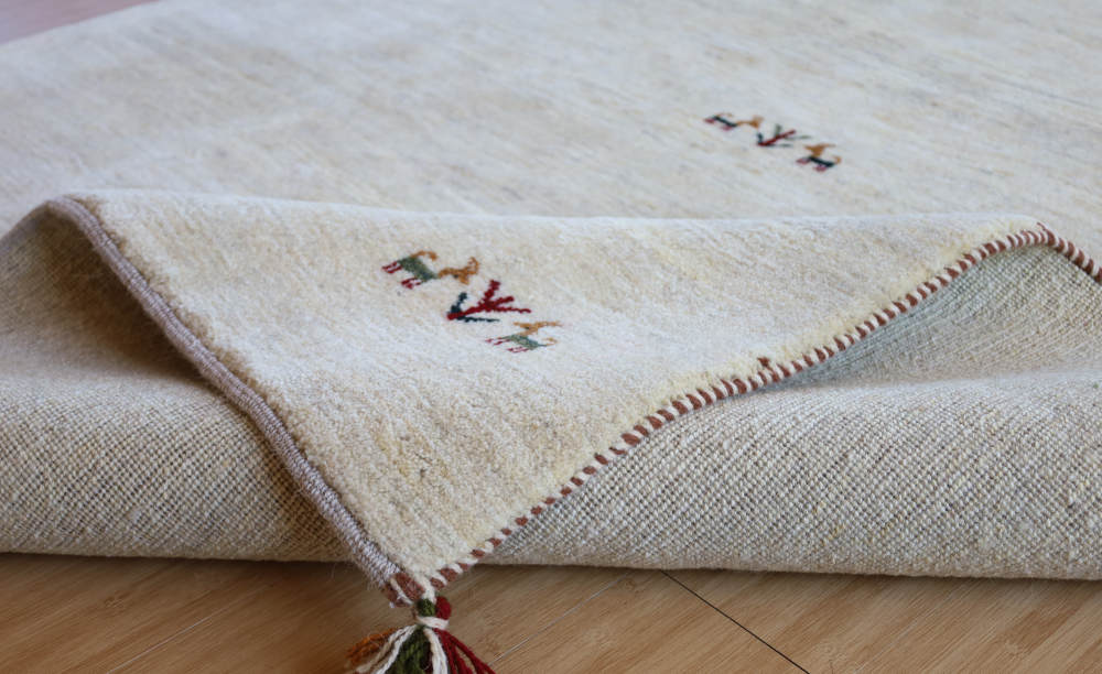 ギャッベ　イラン産　232×173cm　cg21625　角を折り曲げたところ