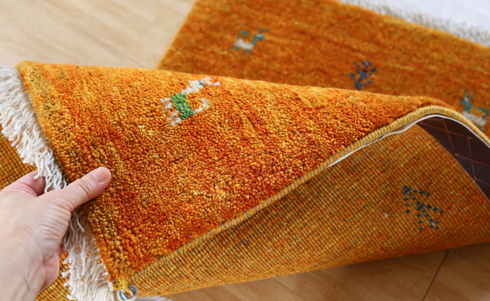ギャッベ玄関マット　87×58cm　オレンジ色　模様の近影