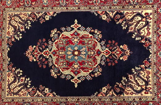 イランで織られるペルシャ絨毯
